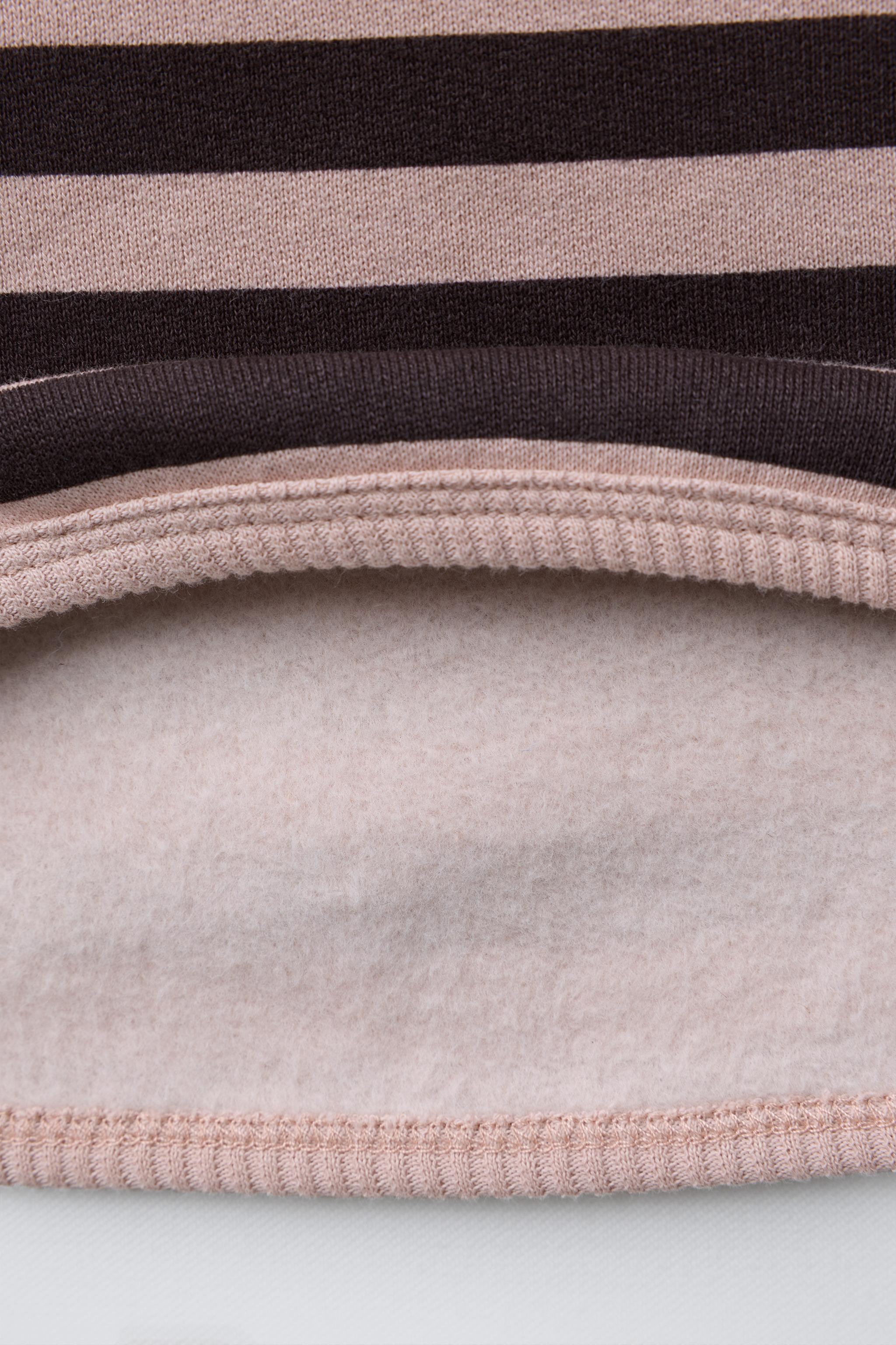 NAON JEONG © STRIPED SWEATSHIRT